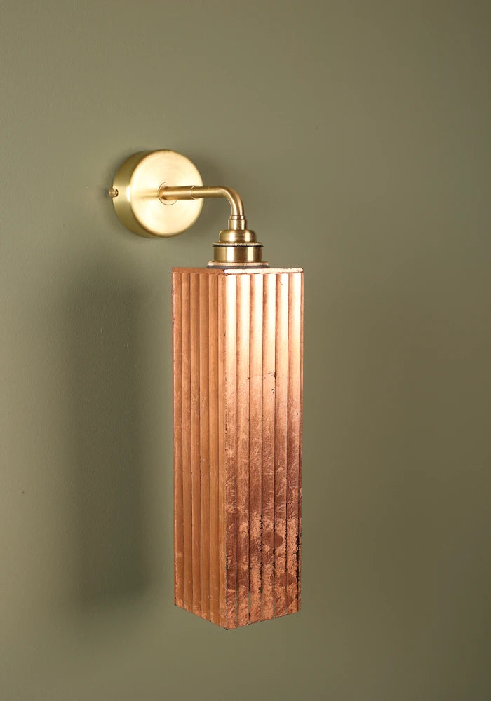 Elegant copper IP44 bathroom wall light with brass fixtures
