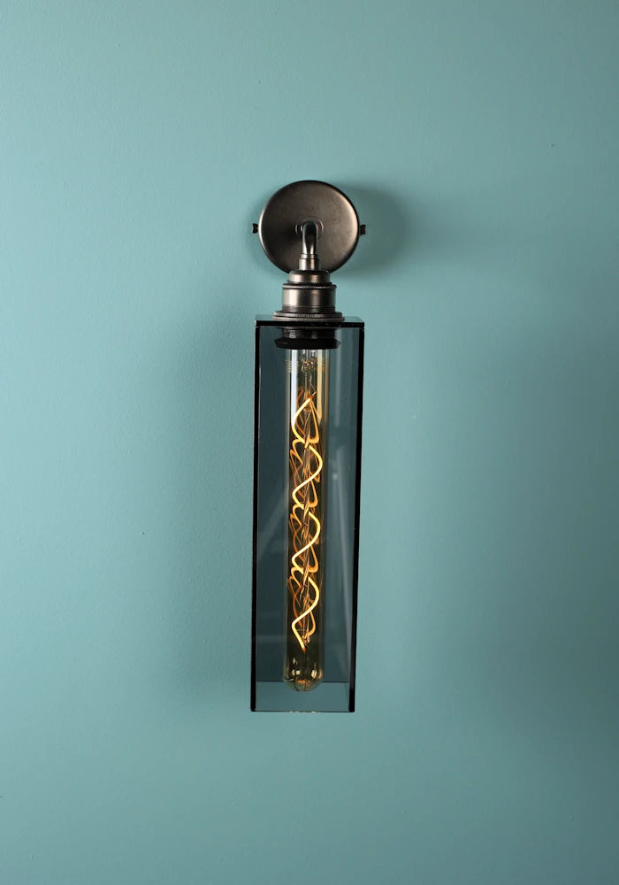Elegant long smoked glass IP44 bathroom wall light with bronze fixtures