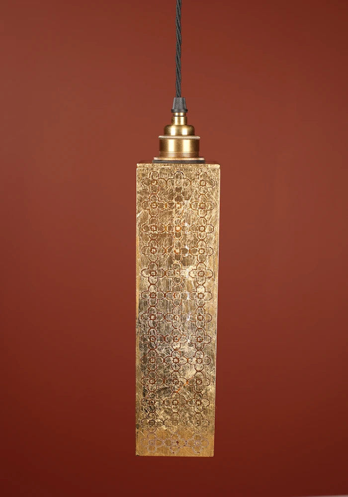 Elegant, rectangular Moroccan style gold pendant light, brass lamp holder and red background