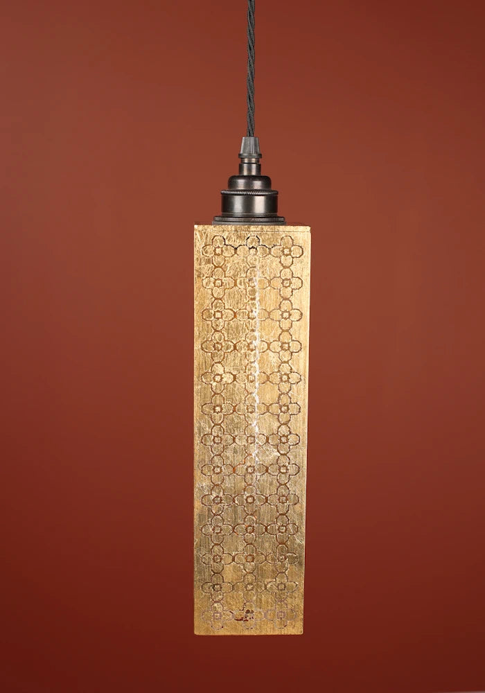 Elegant, rectangular Moroccan style gold pendant light, bronze lamp holder and red background