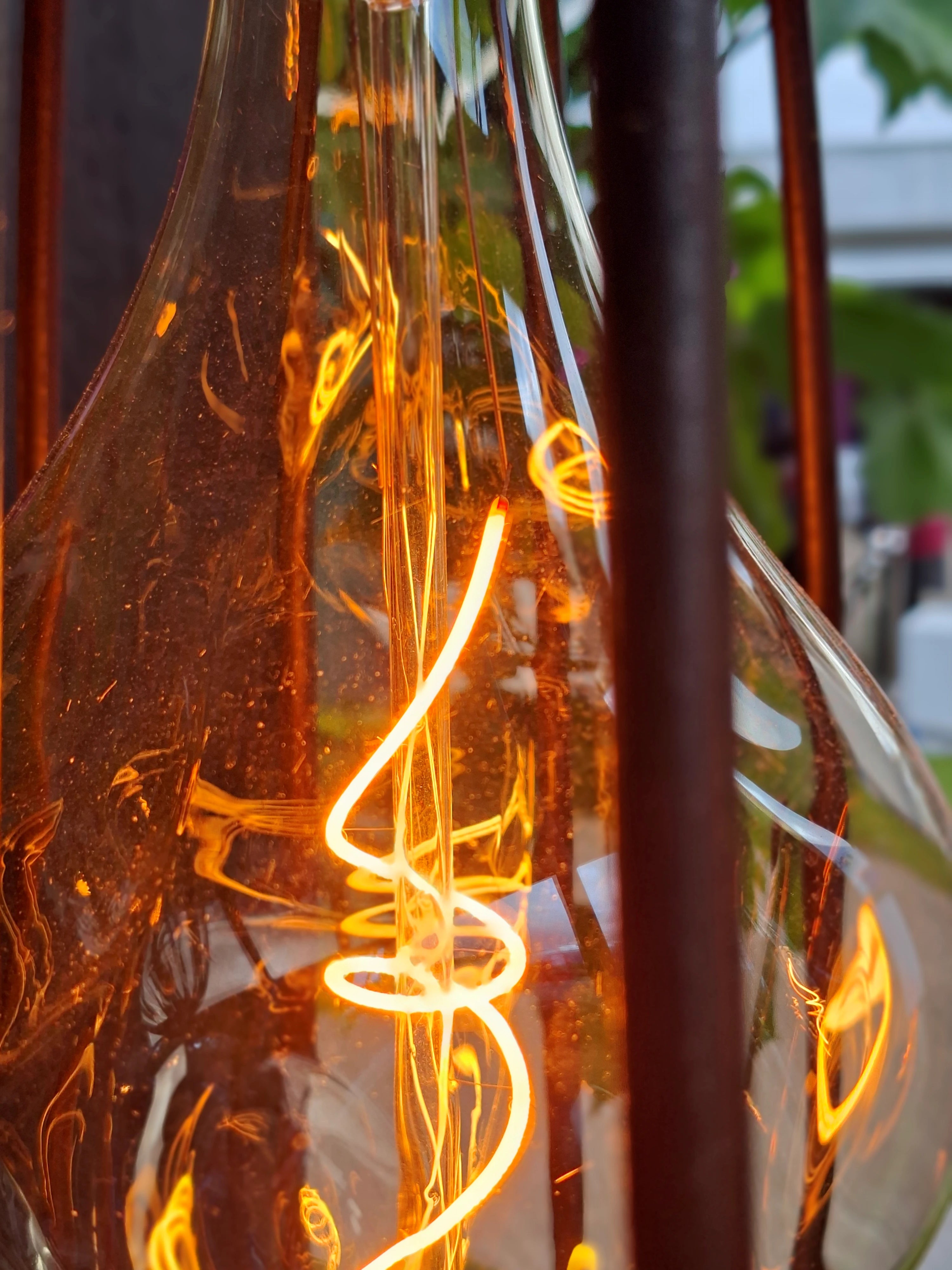 Close-up of a vintage-style light bulb with visible filaments.