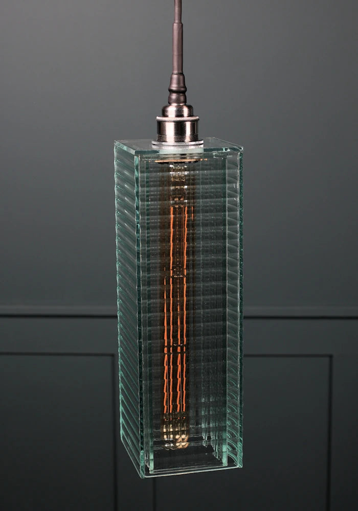 Large ribbed glass bathroom pendant light with nickel lamp holder and black fabric flex