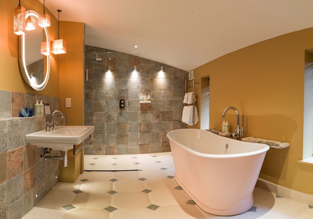 Copper bathroom pendant lights with John Cullen lighting design