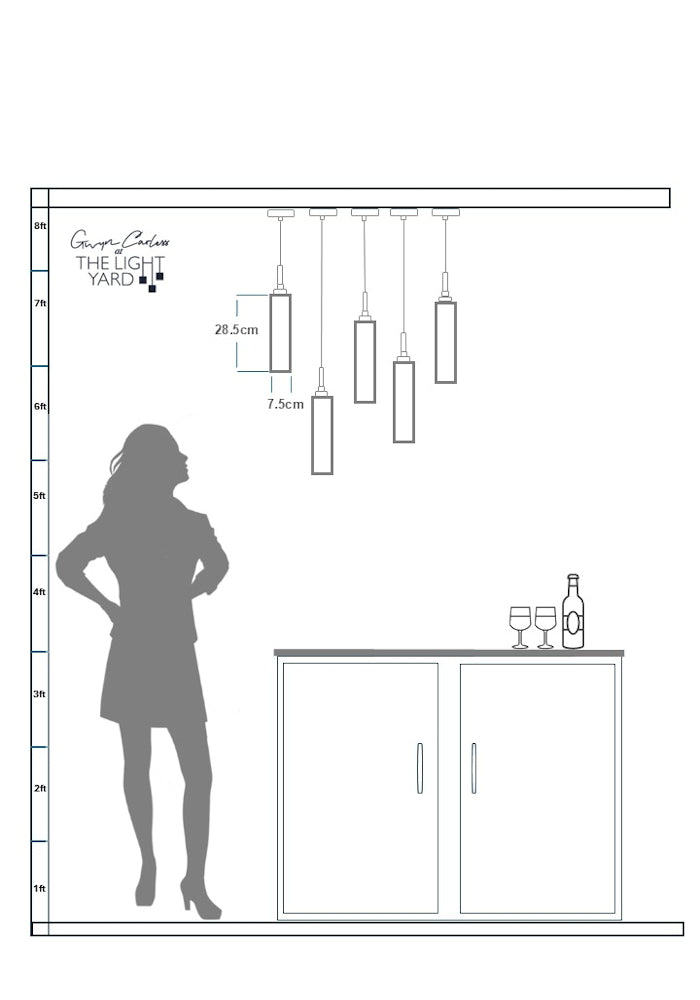 Diagram showing pendant light height measurement relative to a woman's silhouette and a bar counter.