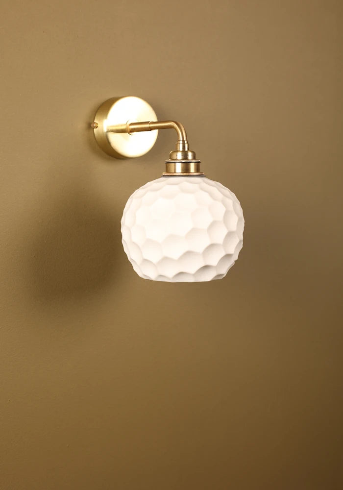 Elegant honeycomb effect ceramic IP44 bathroom wall light with brass fixtures
