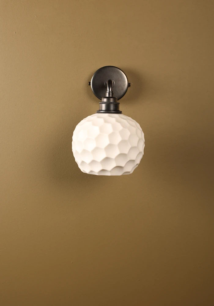 Elegant honeycomb effect ceramic IP44 bathroom wall light with bronze fixtures