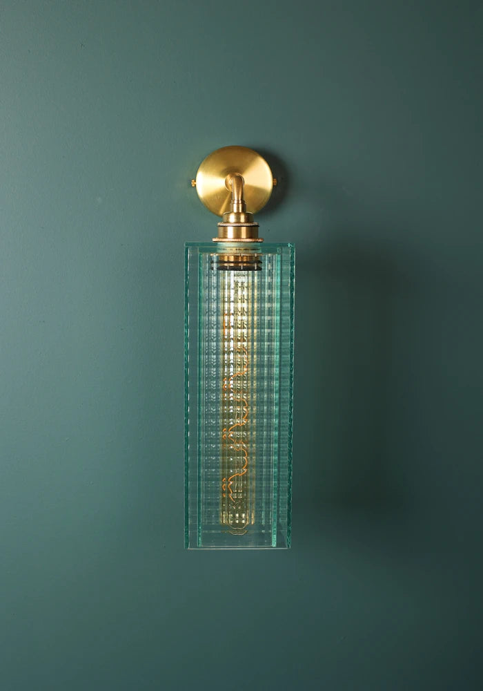 Elegant fluted art deco glass IP44 bathroom wall light with brass fixtures
