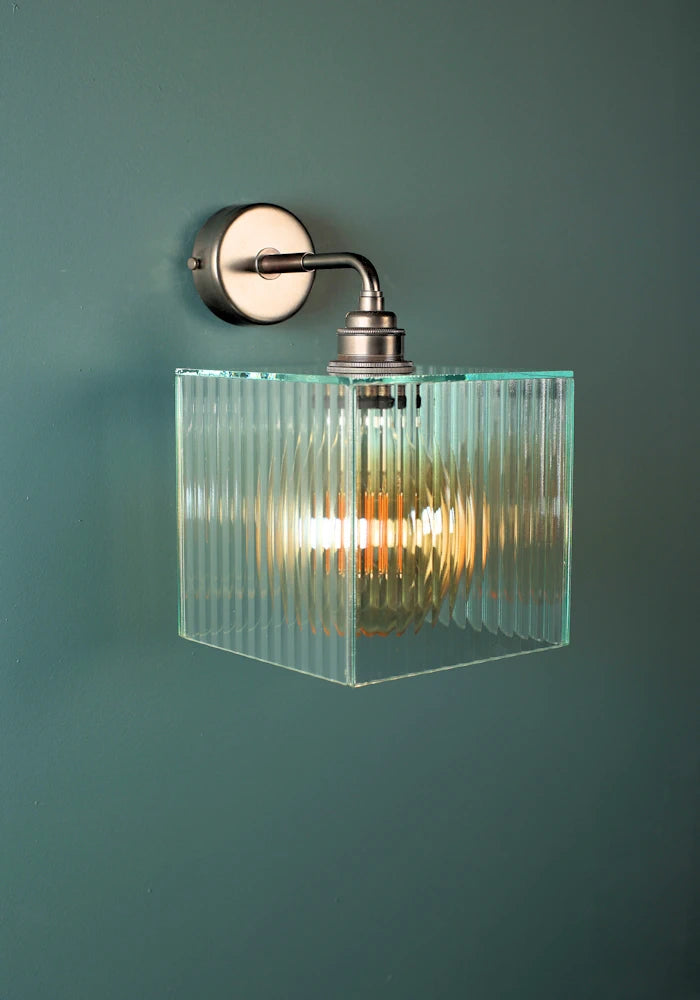 Elegant square ribbed glass IP44 bathroom wall light with bronze fixture