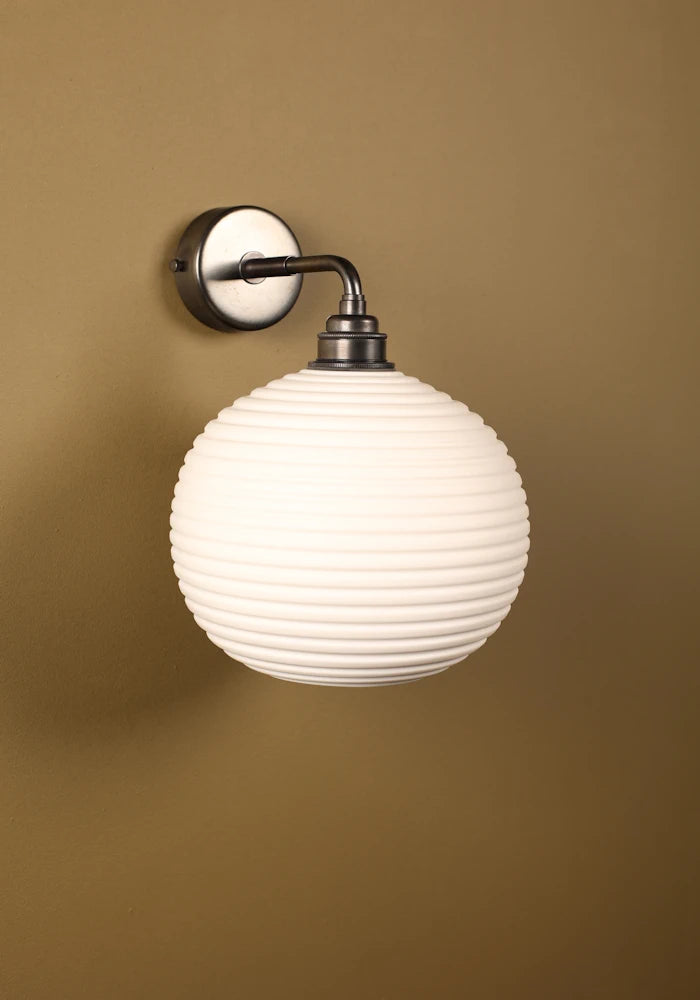 Elegant round ceramic IP44 bathroom wall light with bronze fixtures 