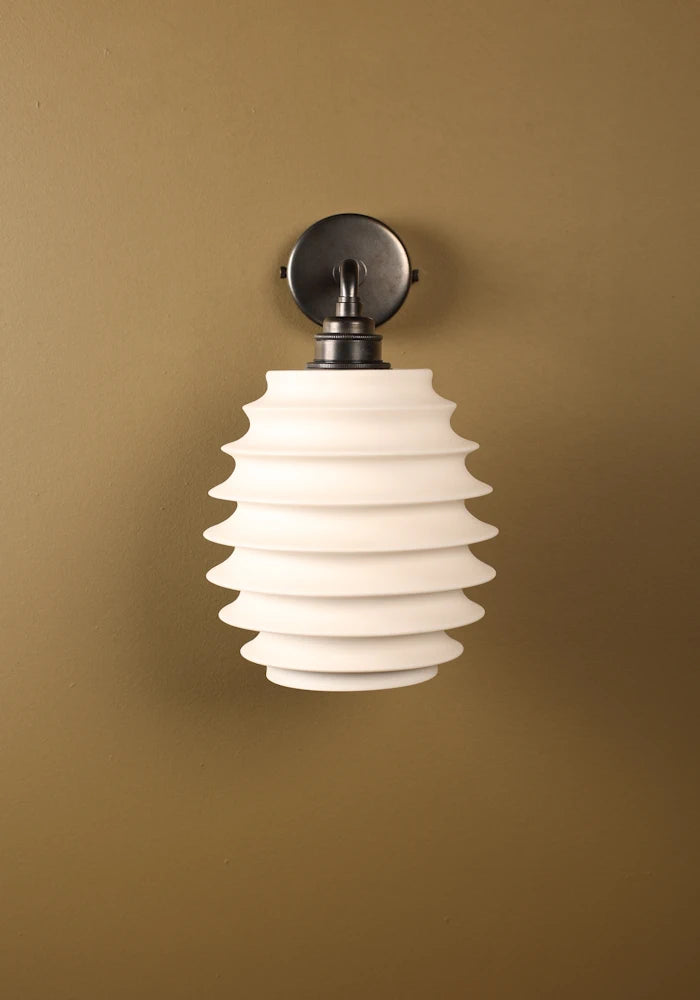 Elegant concertina style ceramic IP44 bathroom wall light with bronze fixtures