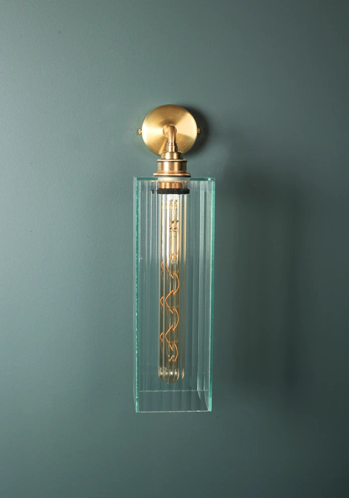 Elegant large ribbed glass ip44 bathroom wall light with brass fixture