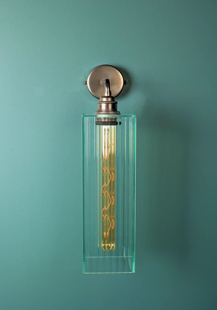 Elegant large ribbed glass ip44 bathroom wall light with bronze fixture