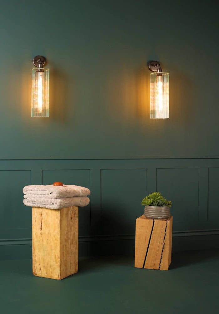 Elegant large ribbed glass ip44 bathroom wall light, towels and bathroom decor