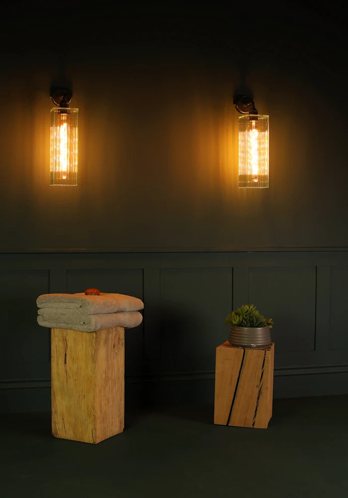 Elegant large ribbed glass ip44 bathroom wall light, towels and bathroom decor