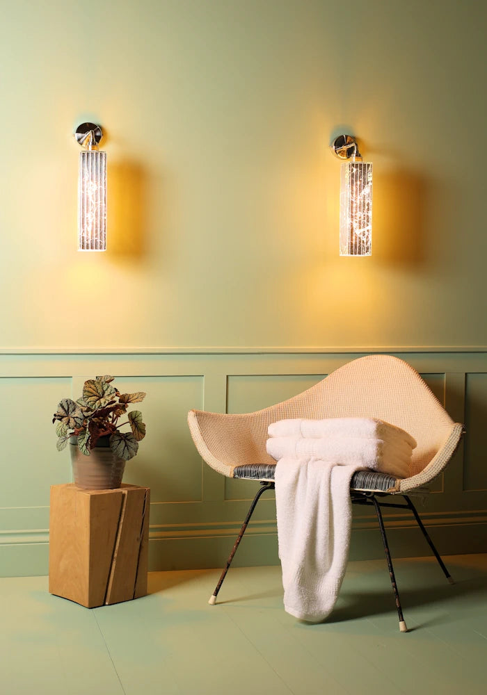 Elegant long silver IP44 bathroom wall lights, art deco chair, pot plant 