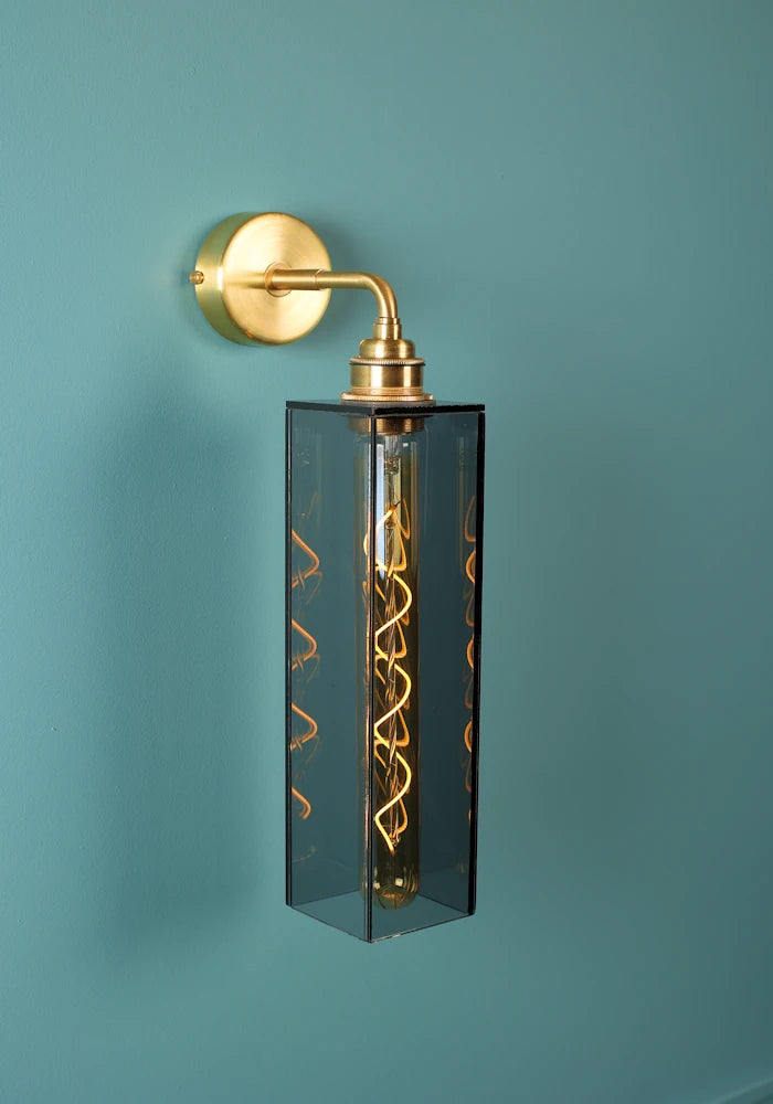Elegant long smoked glass IP44 bathroom wall light with brass fixtures
