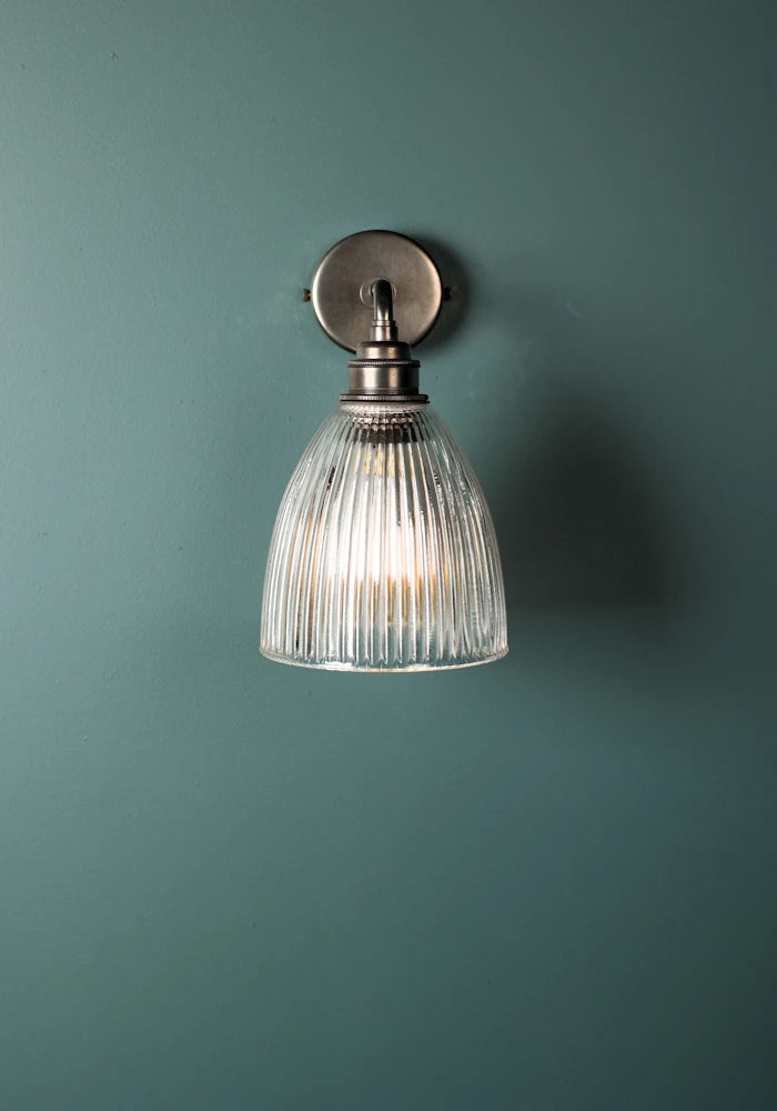 Elegant small bell glass IP44 bathroom wall light with bronze fixtures