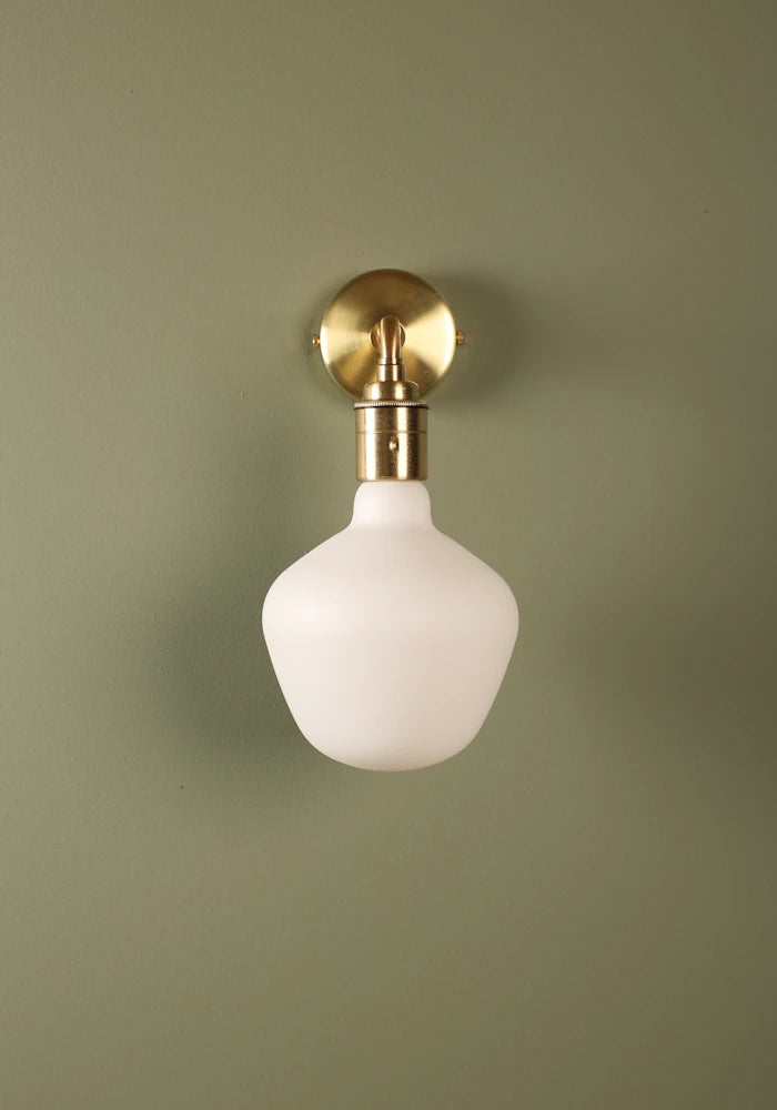 Elegant Tala Enno IP44 bathroom wall light with brass fixtures
