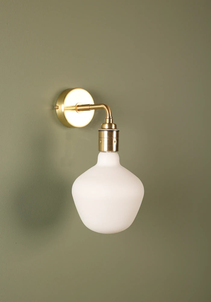Elegant Tala Enno IP44 bathroom wall light with brass fixtures