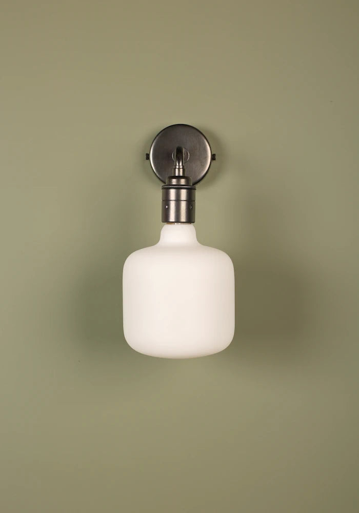 Elegant Tala Oblo IP44 bathroom wall light with bronze fixtures