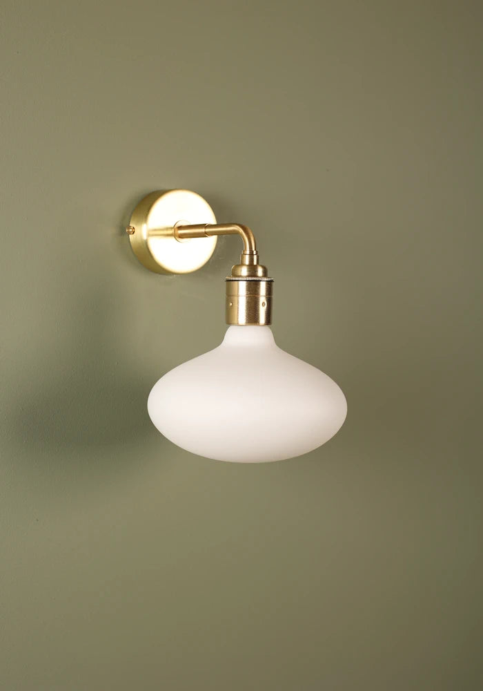 Elegant Tala Oval  IP44 bathroom wall light with brass fixtures