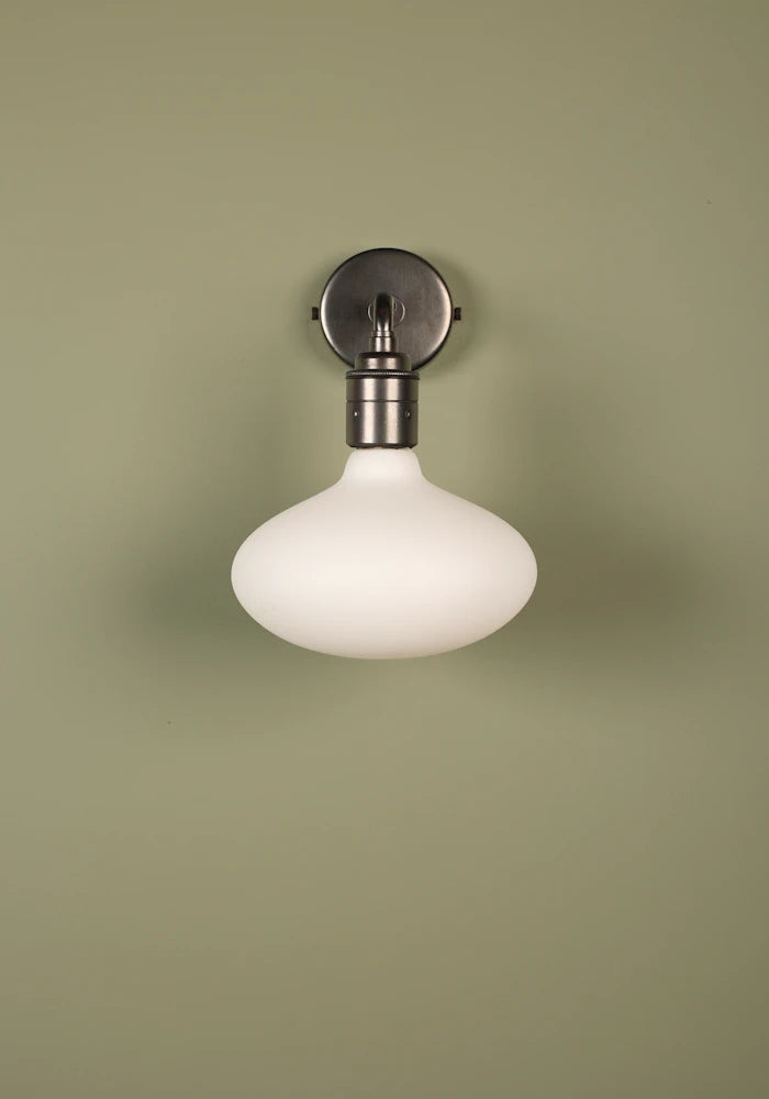 Elegant Tala Oval  IP44 bathroom wall light with bronze fixtures