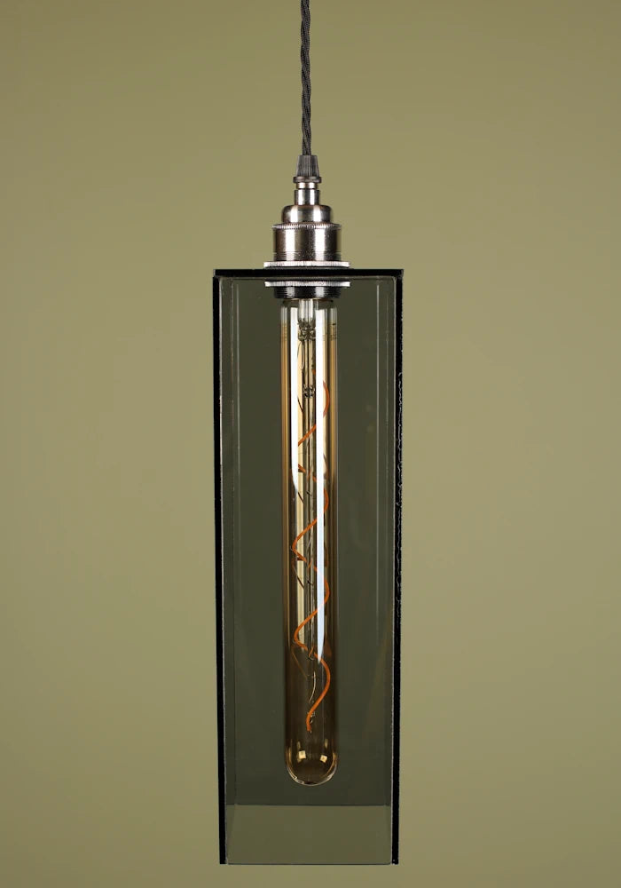 Mid size smoked glass pendant light with nickel lamp holder on sage green background