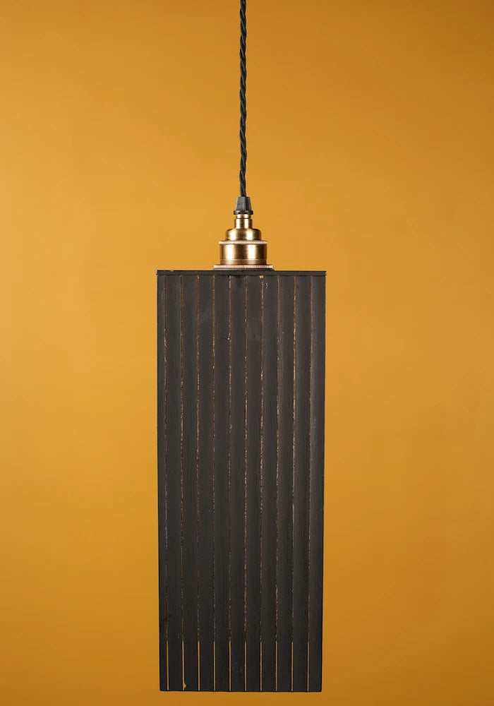 Large black pendant light, brass lamp holder with mustard coloured background