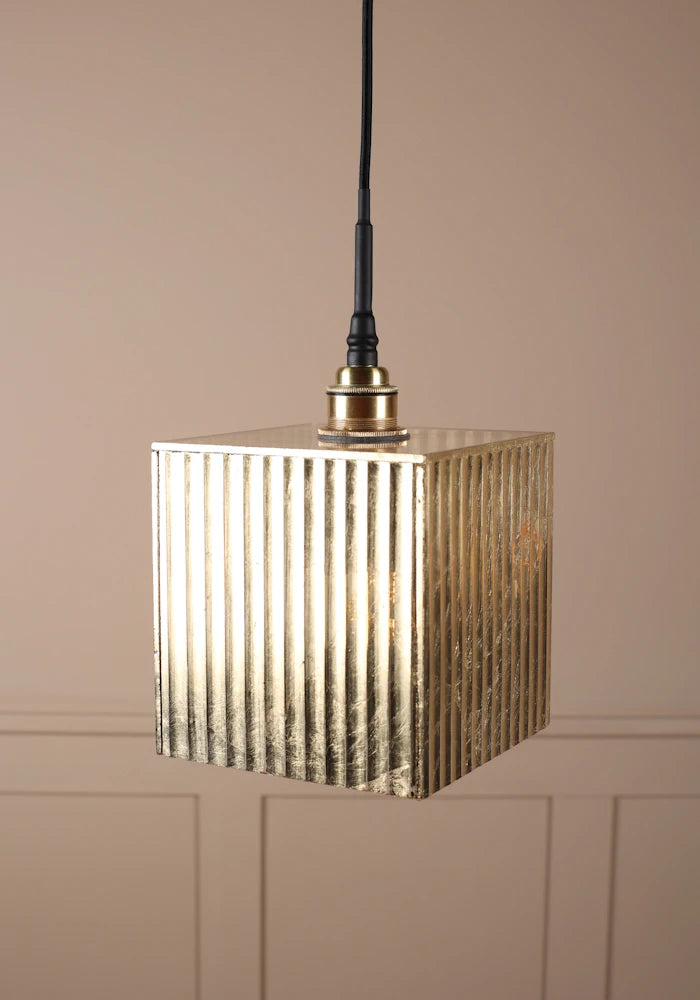 Large cubed gold leaf bathroom pendant light with brushed brass lamp holder.