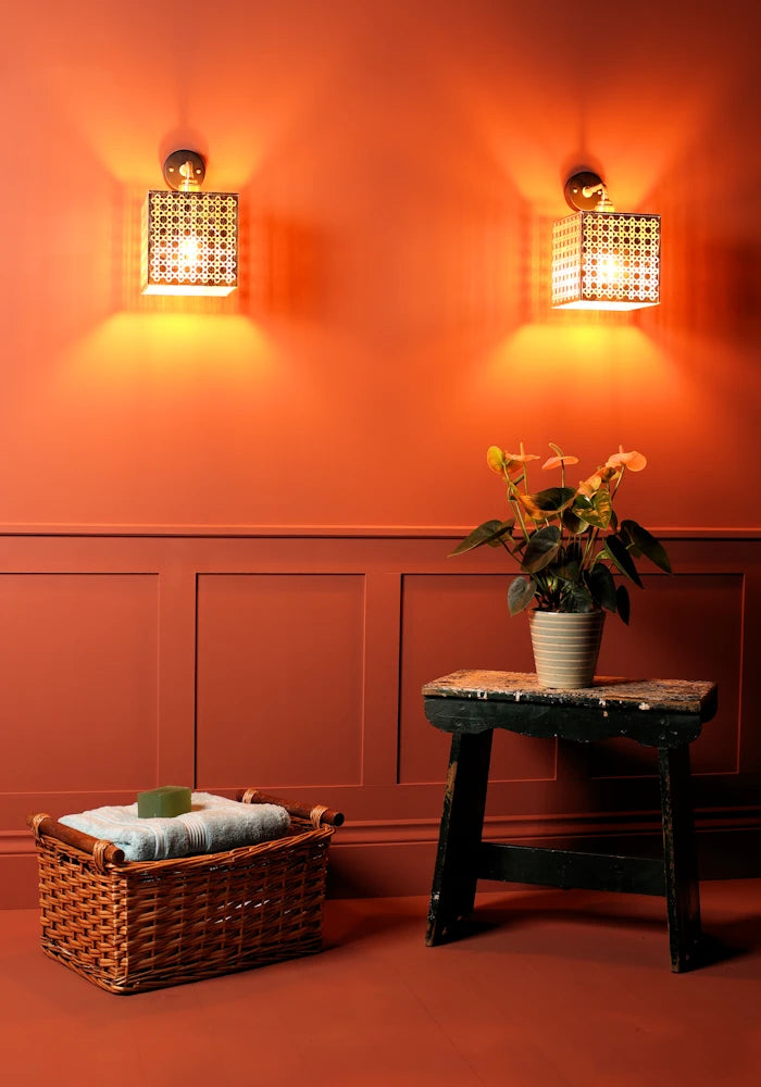 Elegant square Moroccan style gold IP44 bathroom wall lights, basket with bath towels, pot plant