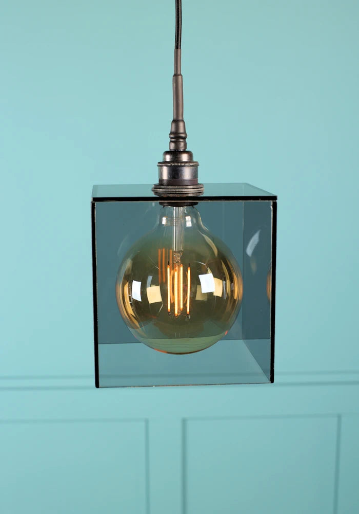 Large square smoked glass bathroom pendant light with antique bronze lamp holder.