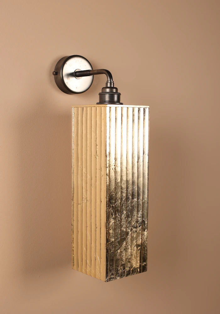 Elegant large ribbed glass ip44 gold leaf bathroom wall light close up with bronze wall plate 