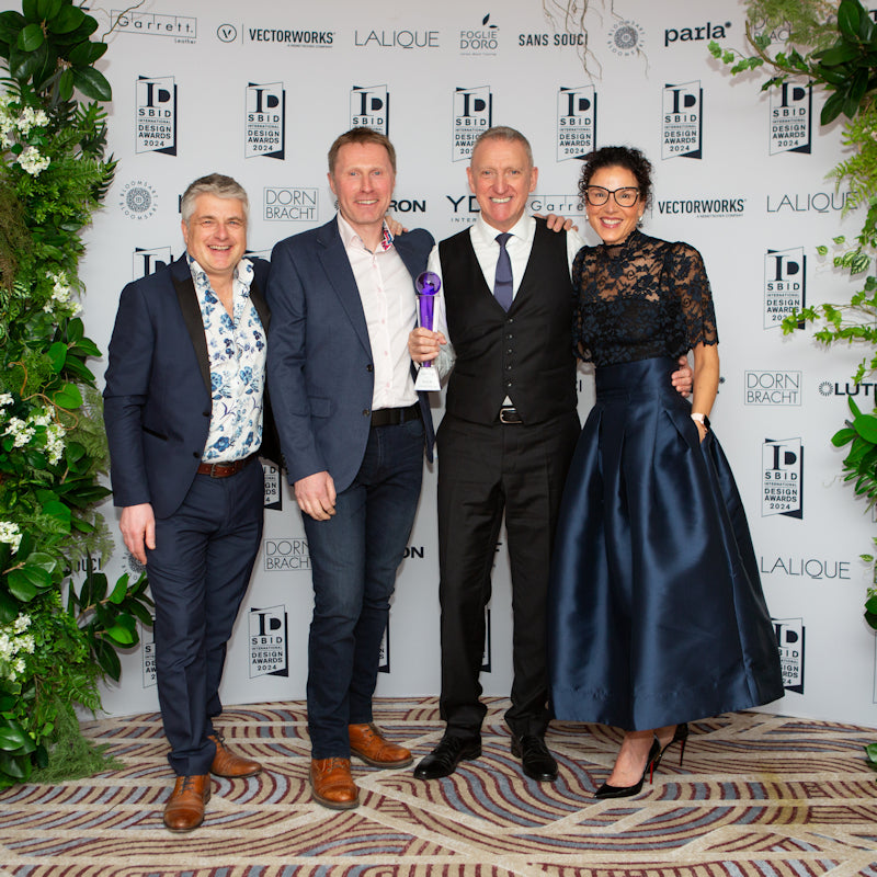 Celebrating SBID® Awards win in the lighting category for their design collaboration on the Focus SB® Ambassador Wall Light (from left to right): Jeff Fuller and Gwyn, Gwyn Carless at The Light Yard with Mike Johnson and Gennifer Beckwith, Focus SB.