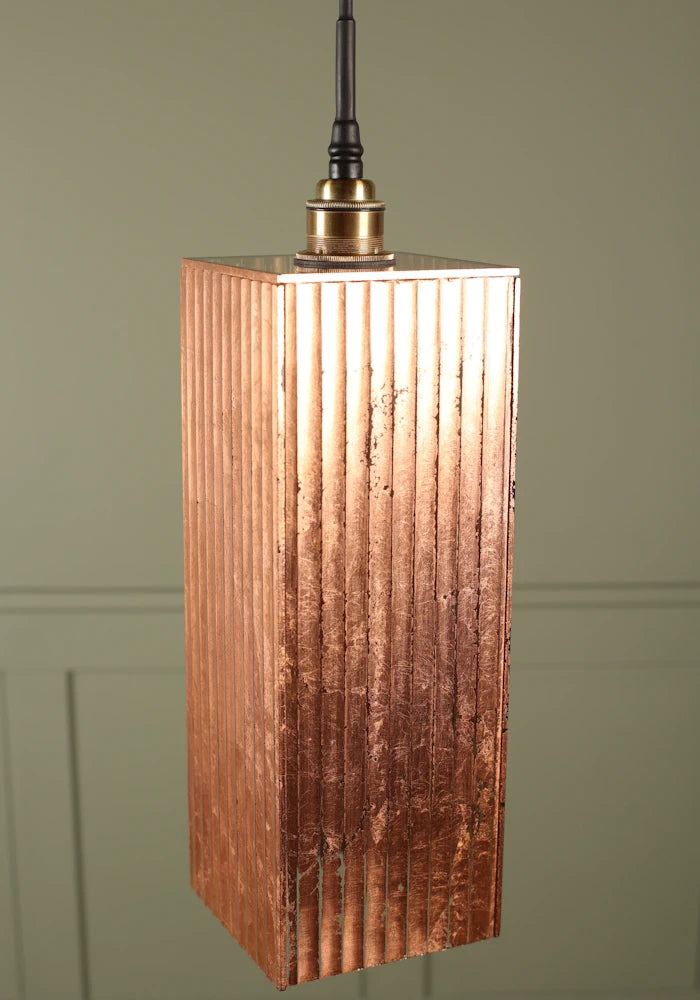 Large rectangular copper leaf bathroom pendant light with brushed brass lamp holder.