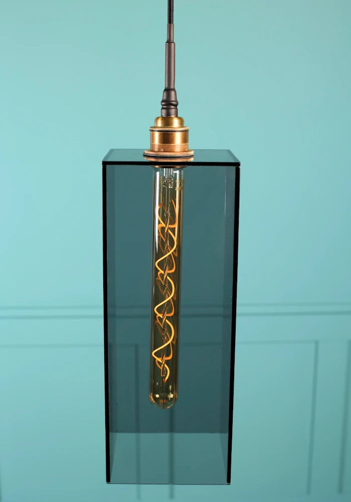 Large rectangular smoked glass bathroom pendant light with brushed brass lamp holder.