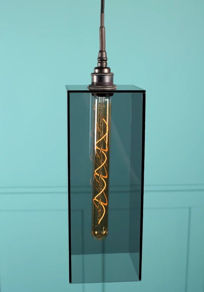 Large rectangular smoked glass bathroom pendant light with antique bronze lamp holder.